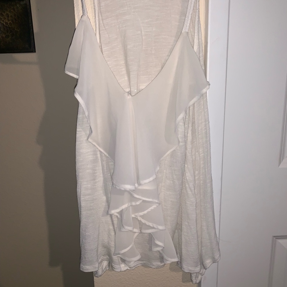 White ruffle blouse